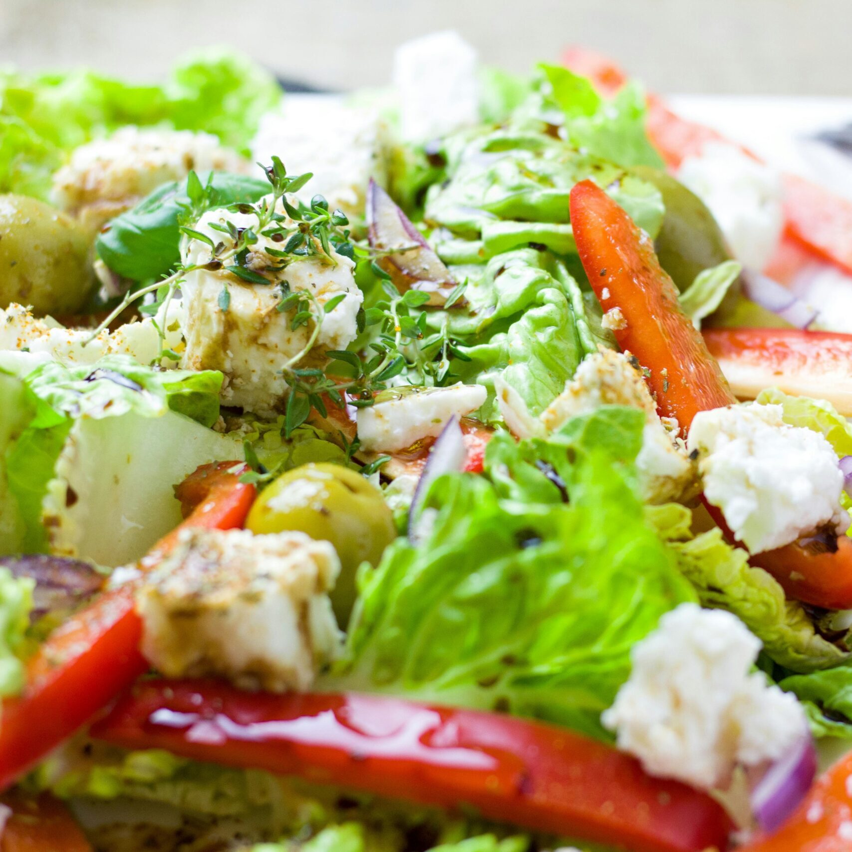 Colorful Greek salad with fresh vegetables and feta cheese.